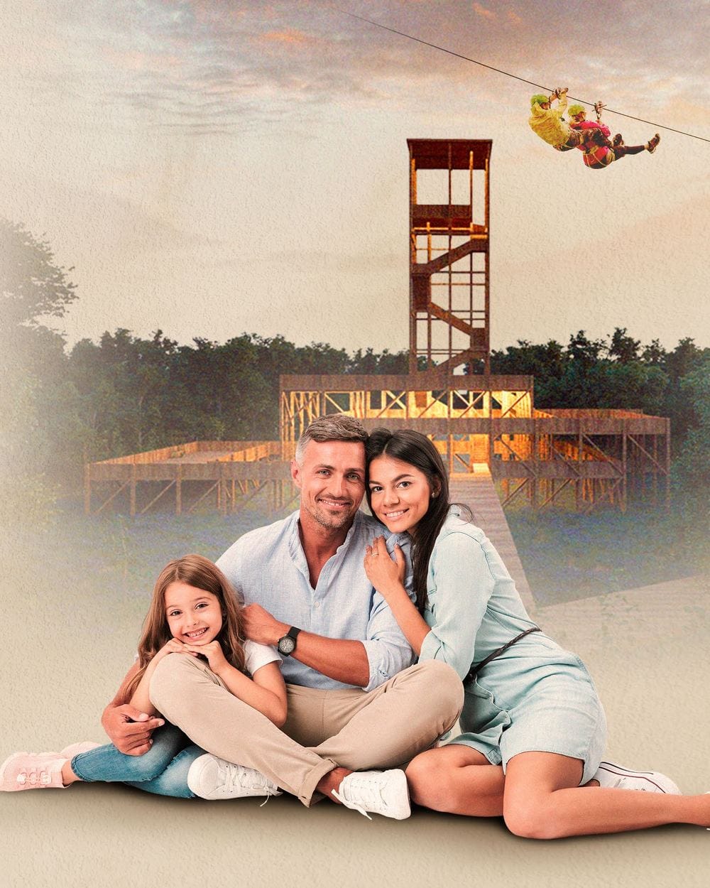 Familia en el ecoparque de Santa Clara Ecovillage con la torre del mirador al fondo
